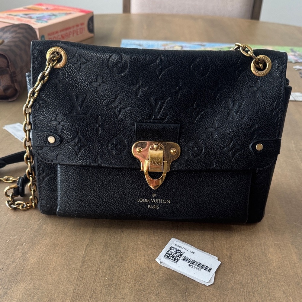 Louis Vuitton Black Crossbody Bag with Gold Accents